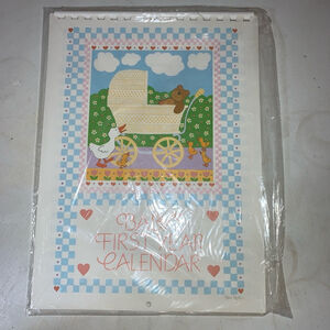 Vintage “Baby’s First Year Calendar” new old stock in the original packaging